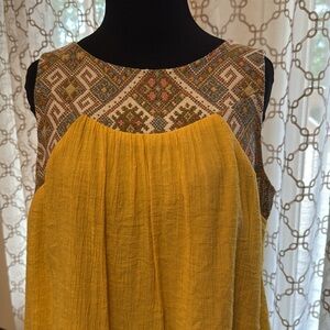 Yellow Sleeveless Top with Patterned Neckline